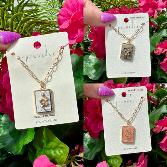 Gilded Snake Pendant Necklace